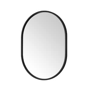 Emmeline 24 in. W x 32 in. H Oval Framed Wall Mount Bathroom Vanity Mirror in Black