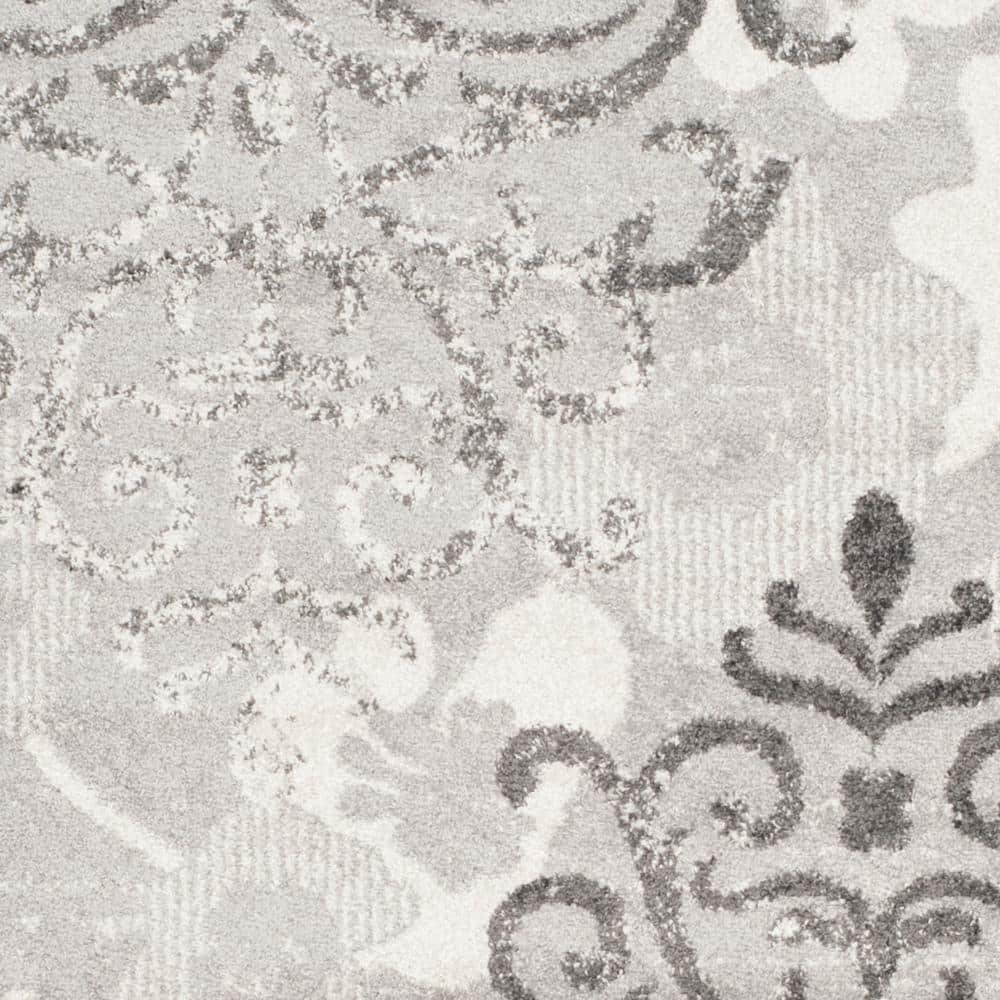 Silver and Ivory Floral Reversible 4' x 6' Synthetic Rug