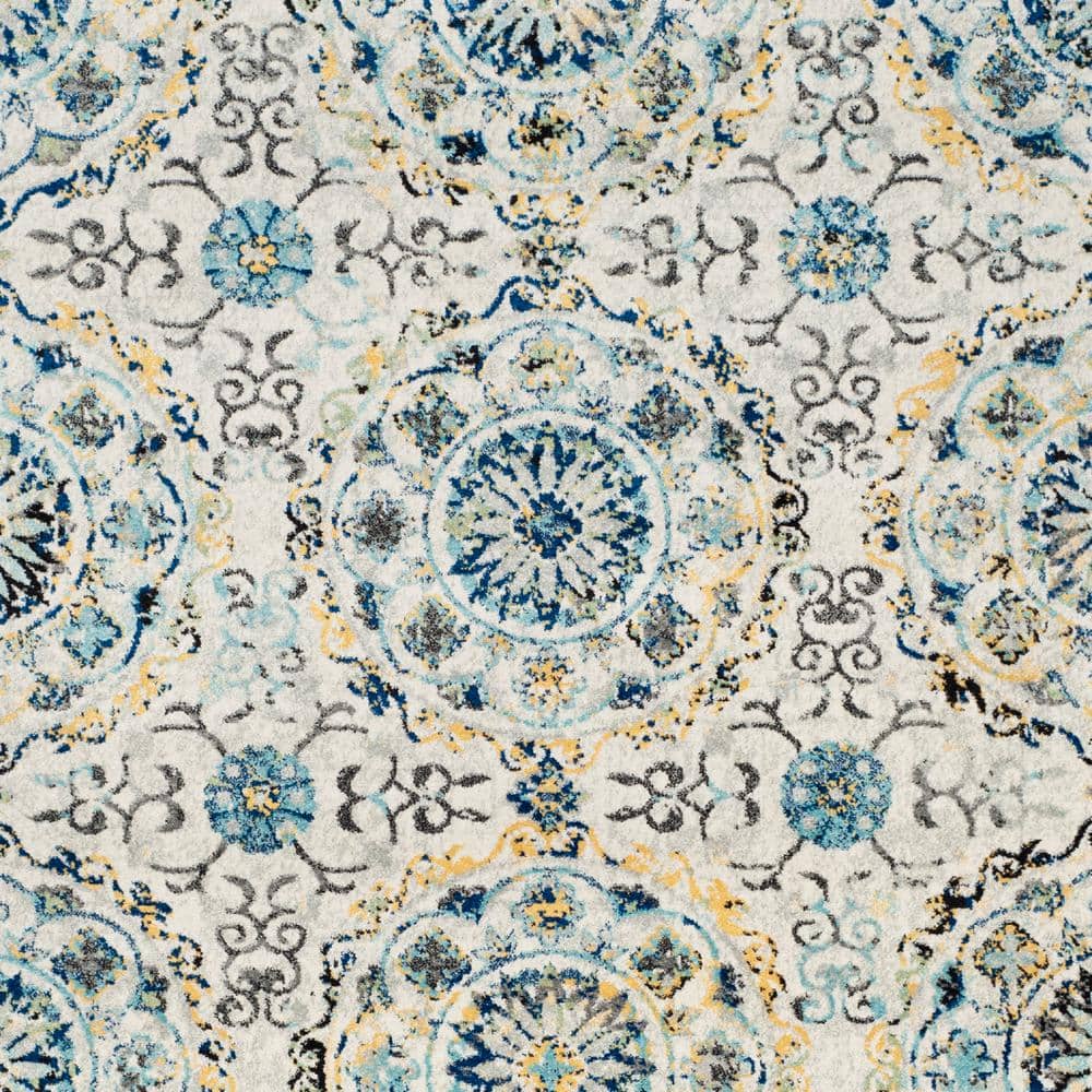 Ivory and Blue Floral Motif Synthetic Area Rug