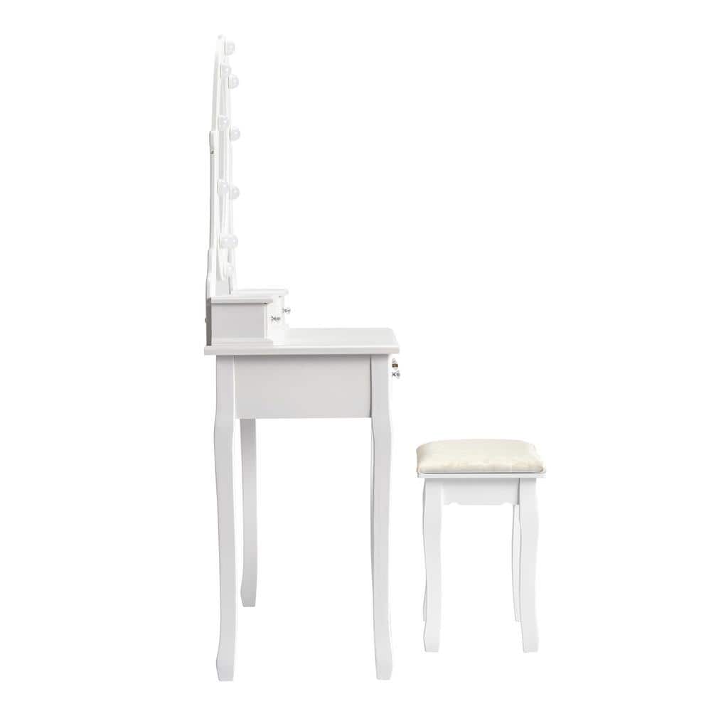 White dressing vanity table set with mirror and stool.