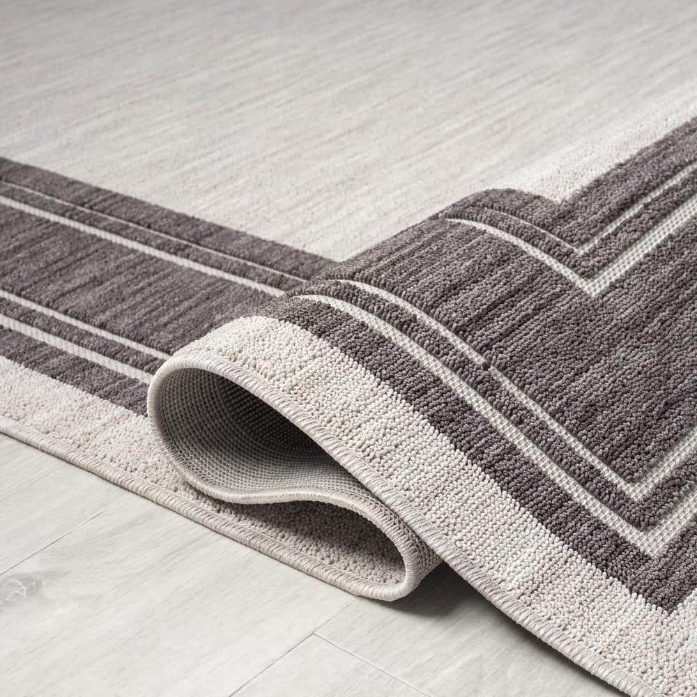 Winona 5' x 7' Ivory Rectangular Synthetic Area Rug