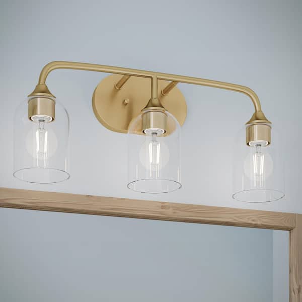 Ilia 22 In. 3-Light Brushed Gold Transitional Bath Vanity Light with Clear Glass Shades