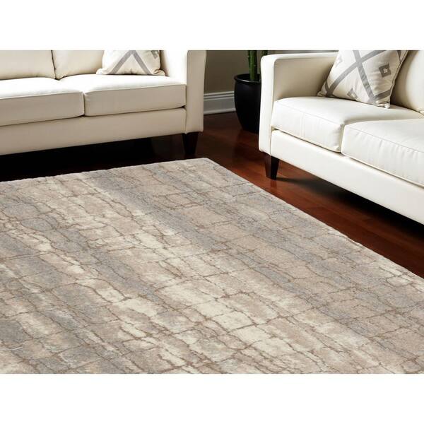 7' X 9' Beige Ivory and Gray Abstract Shag Area Rug