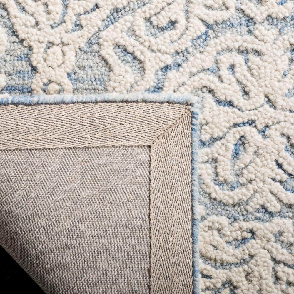 Handmade Tufted Blue/Ivory Floral Wool Area Rug
