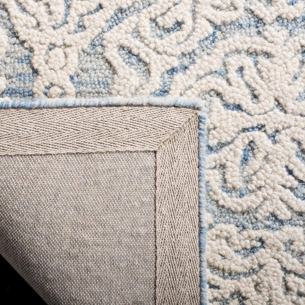 Handmade Blue Ivory Wool Floral 8' x 10' Area Rug