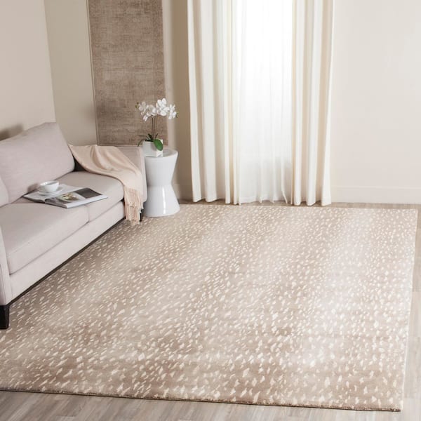 Tibetan 8 ft. x 10 ft. Gray Animal Print Area Rug