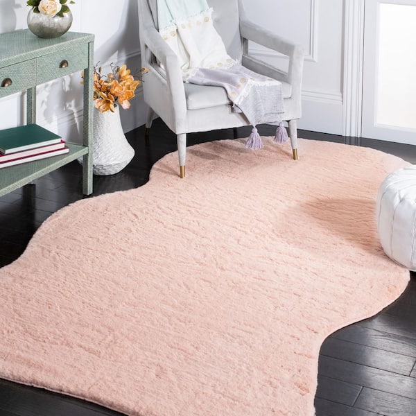 Faux Sheep Skin 6 ft. x 9 ft. Light Pink Flokati Solid Color Area Rug