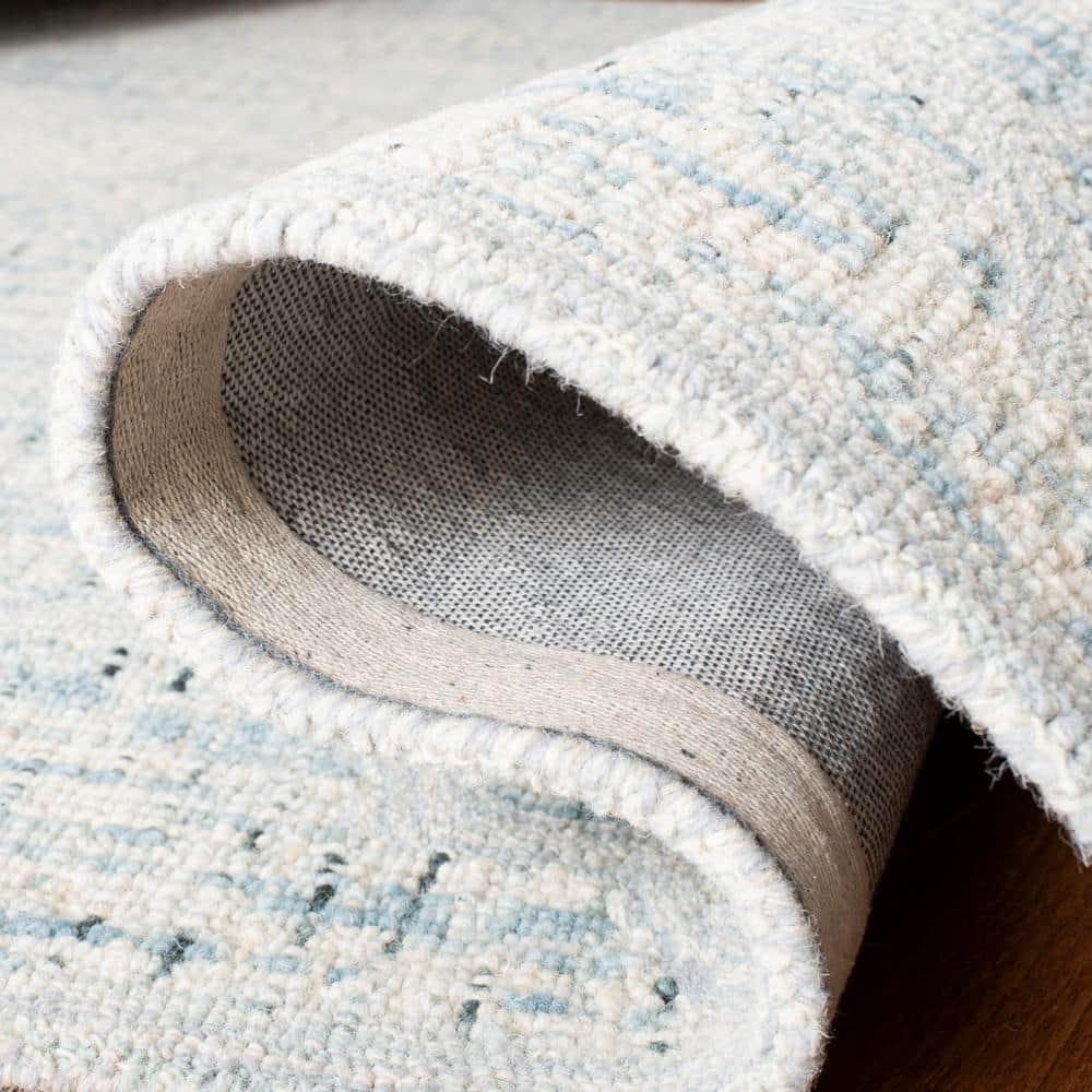 Ivory and Turquoise Abstract Hand-Tufted Wool Area Rug, 2' x 3'