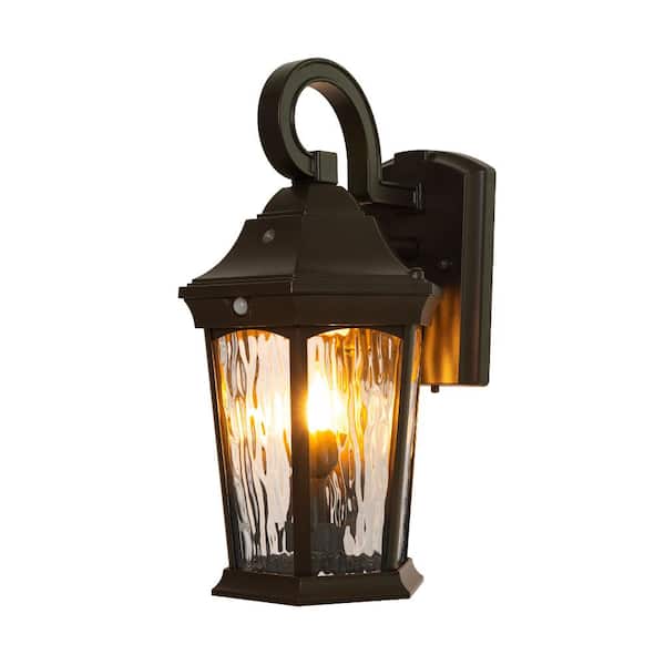 Home Decorators Collection 15.9 in. Bronze Integrated LED Outdoor Wall Lantern Sconce with Flickering Bulb, Motion Sensor, and Photocell