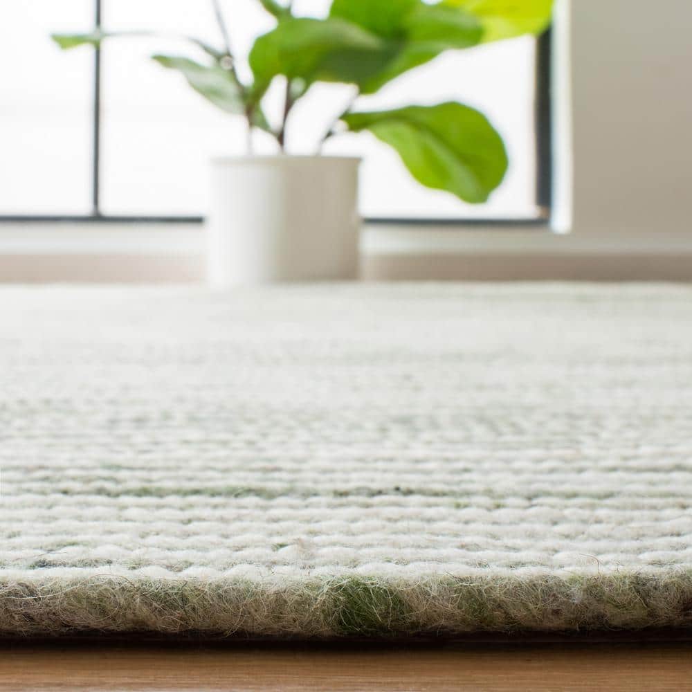 Green and Ivory Braided Wool Oval Area Rug 6' x 9'