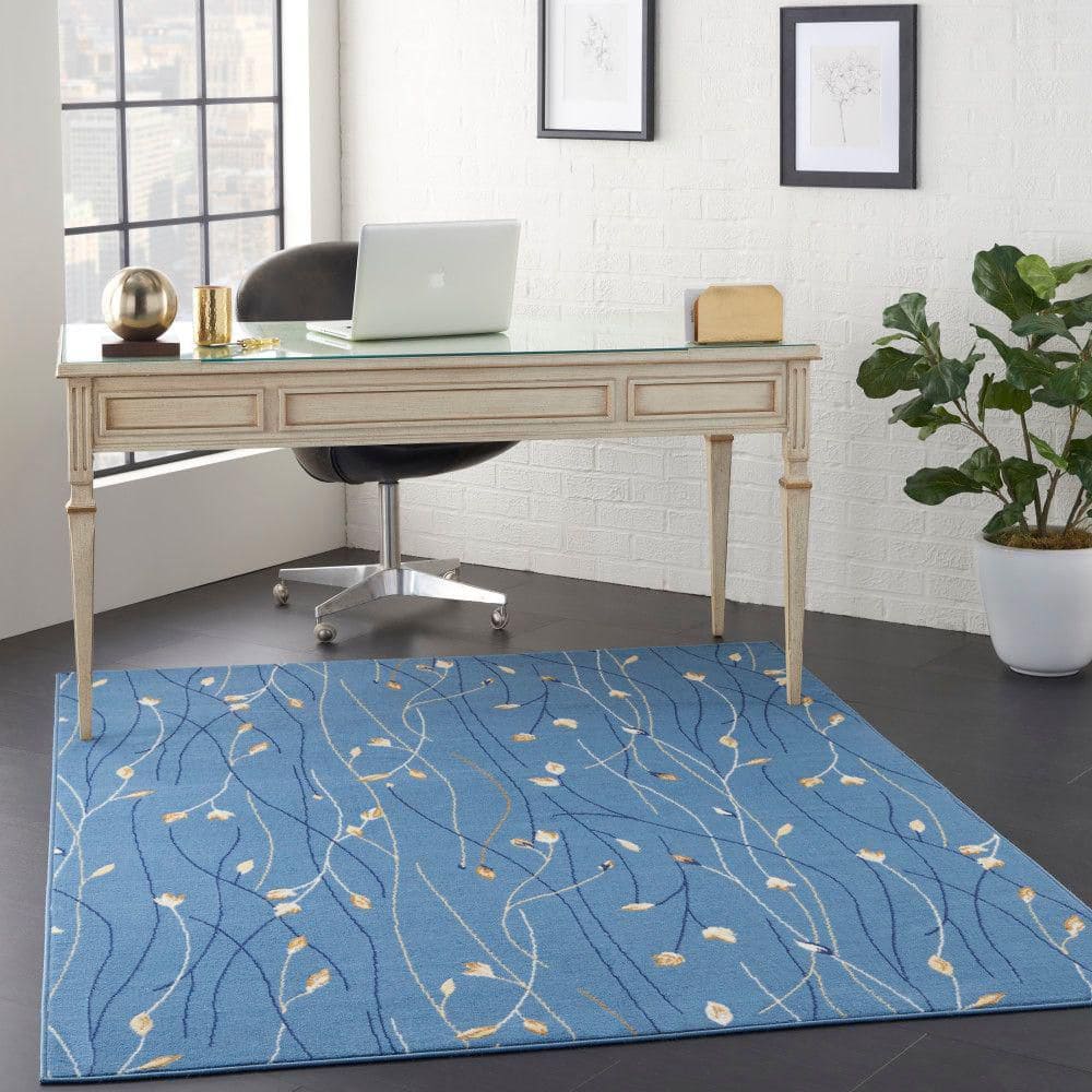 Light Blue Floral Synthetic 5' x 7' Area Rug