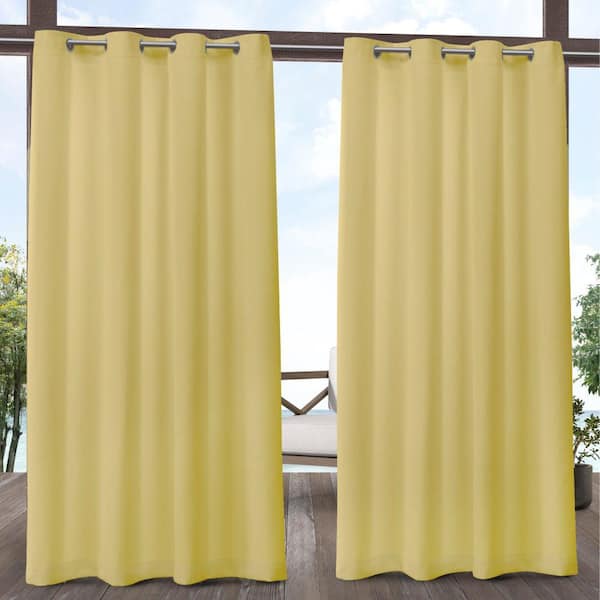 EXCLUSIVE HOME Biscayne Butter Solid Light Filtering Grommet Top Indoor/Outdoor Curtain, 54 in. W x 96 in. L (Set of 2)