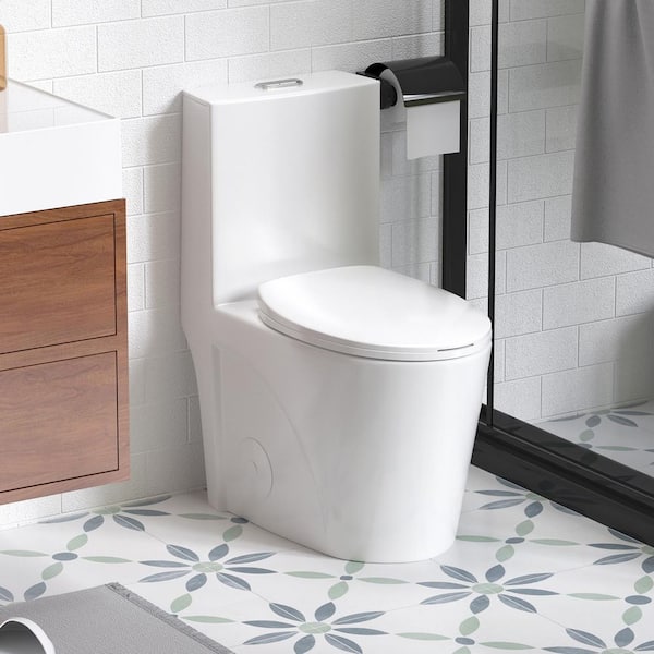 One-Piece 1.1/1.6 GPF Dual Flush Elongated Bowl Toilet in Glossy White Soft Close Seat Included