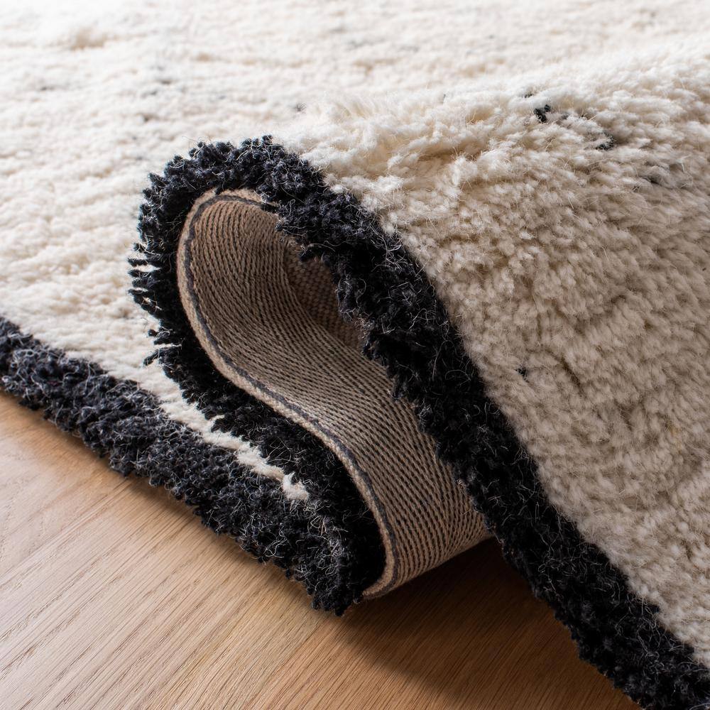 Ivory and Black Geometric Wool Shag Area Rug 3' x 5'
