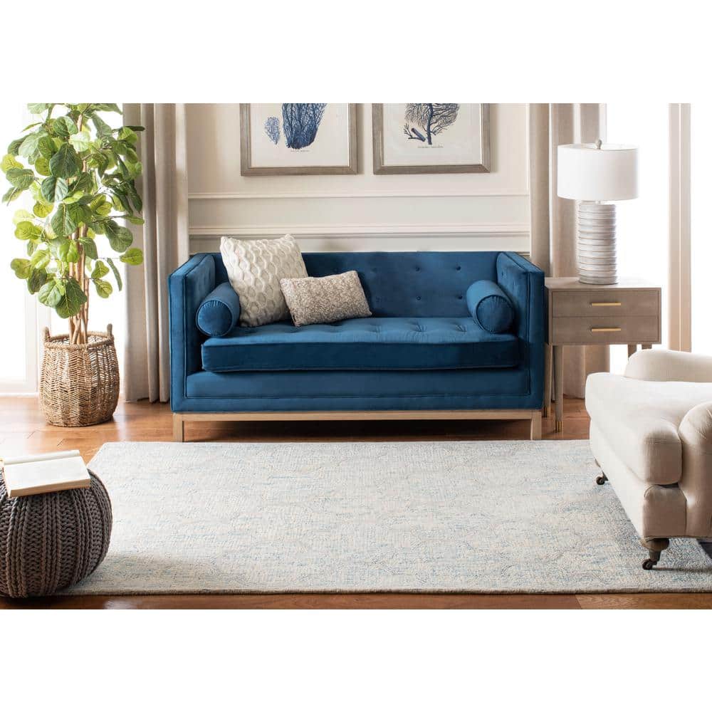 Ivory and Light Blue Handmade Wool Abstract Area Rug