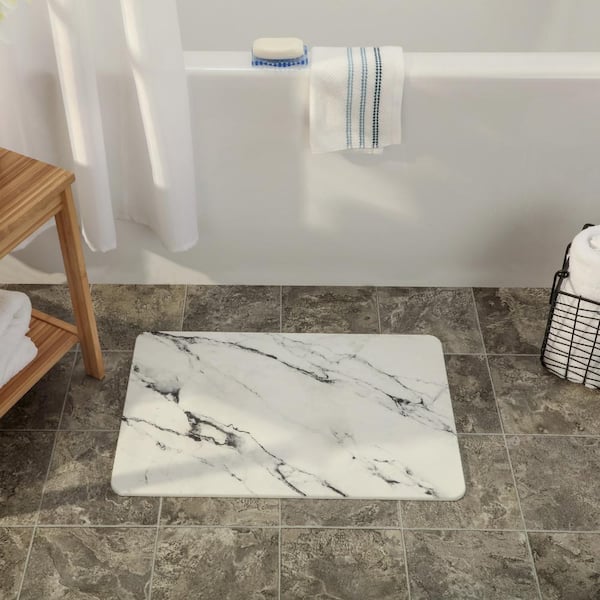 https://images.thdstatic.com/productImages/5261625b-9a75-4222-ae26-75c4877da140/svn/marble-slipx-solutions-bathtub-mats-06900-1-44_600.jpg