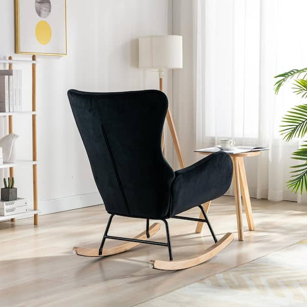 black upholstered rocking chair