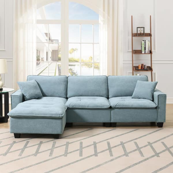 J&E Home 100 in. W Square Arm Suede L-shaped Convertible Sofa with Pillows and Ottoman in. Blue