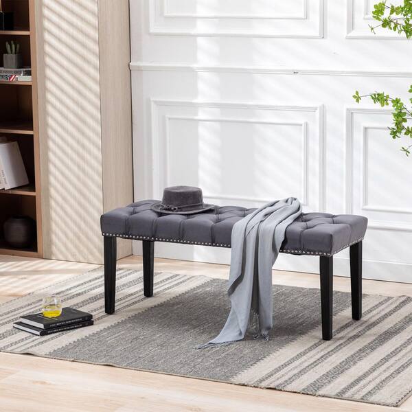 dark gray upholstered bench