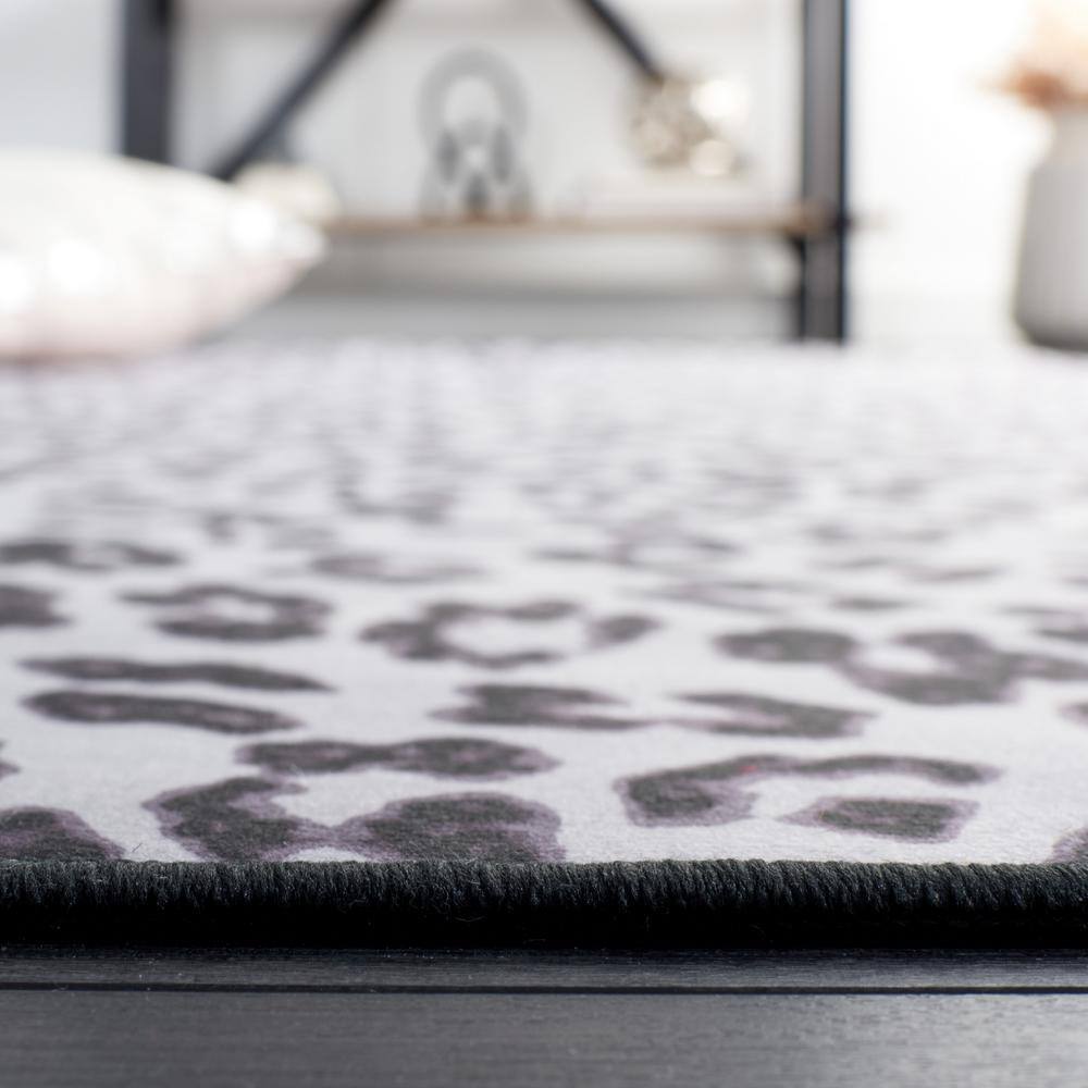 Black and Ivory Faux Fur Animal Print Washable Rug
