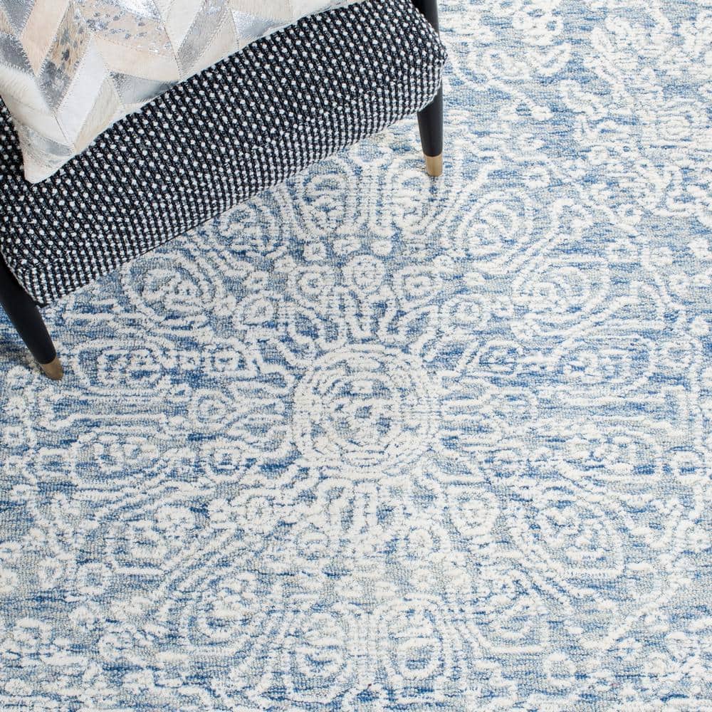 Handmade Blue Floral Wool 4' x 6' Area Rug