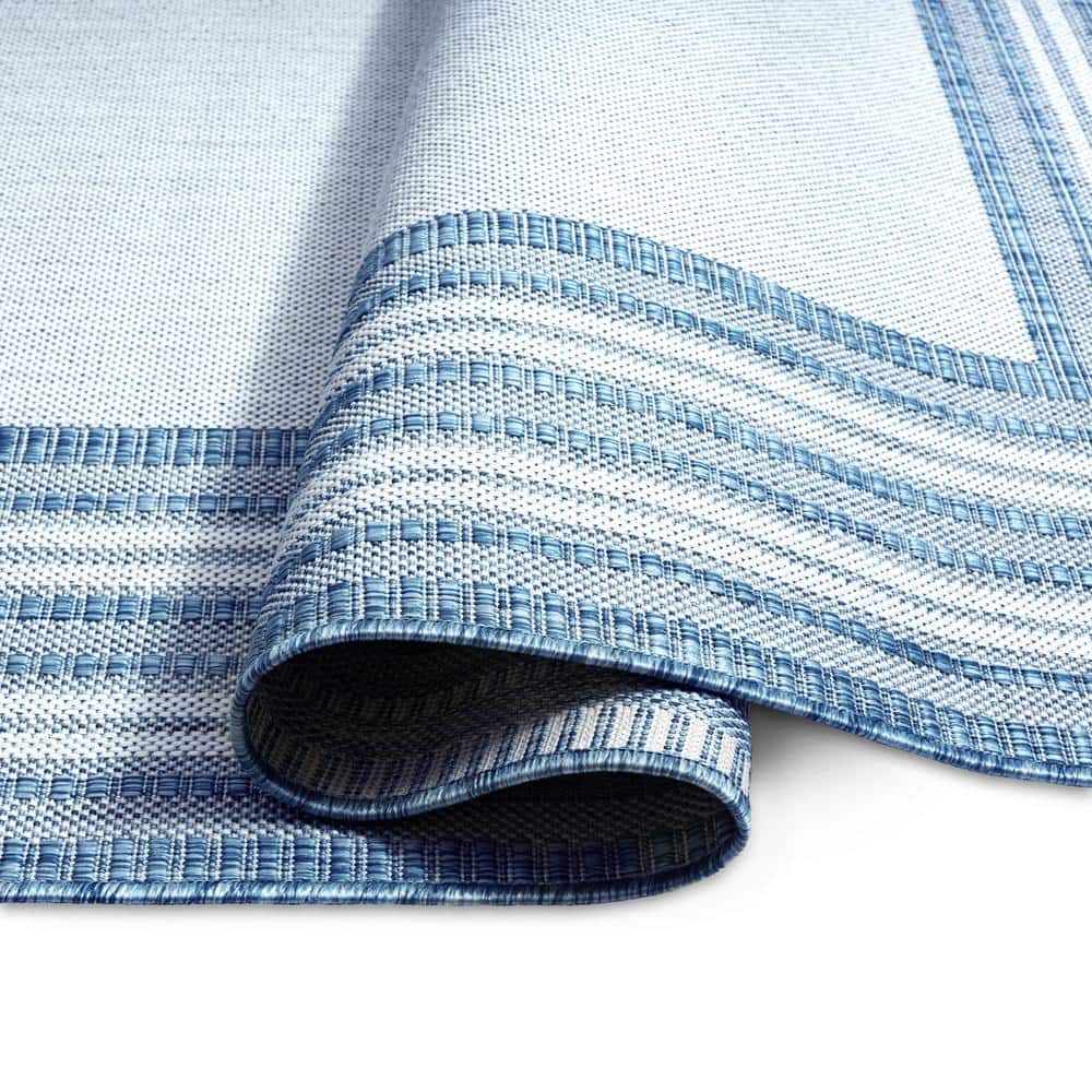 Blue and Ivory Striped Synthetic Indoor/Outdoor Area Rug
