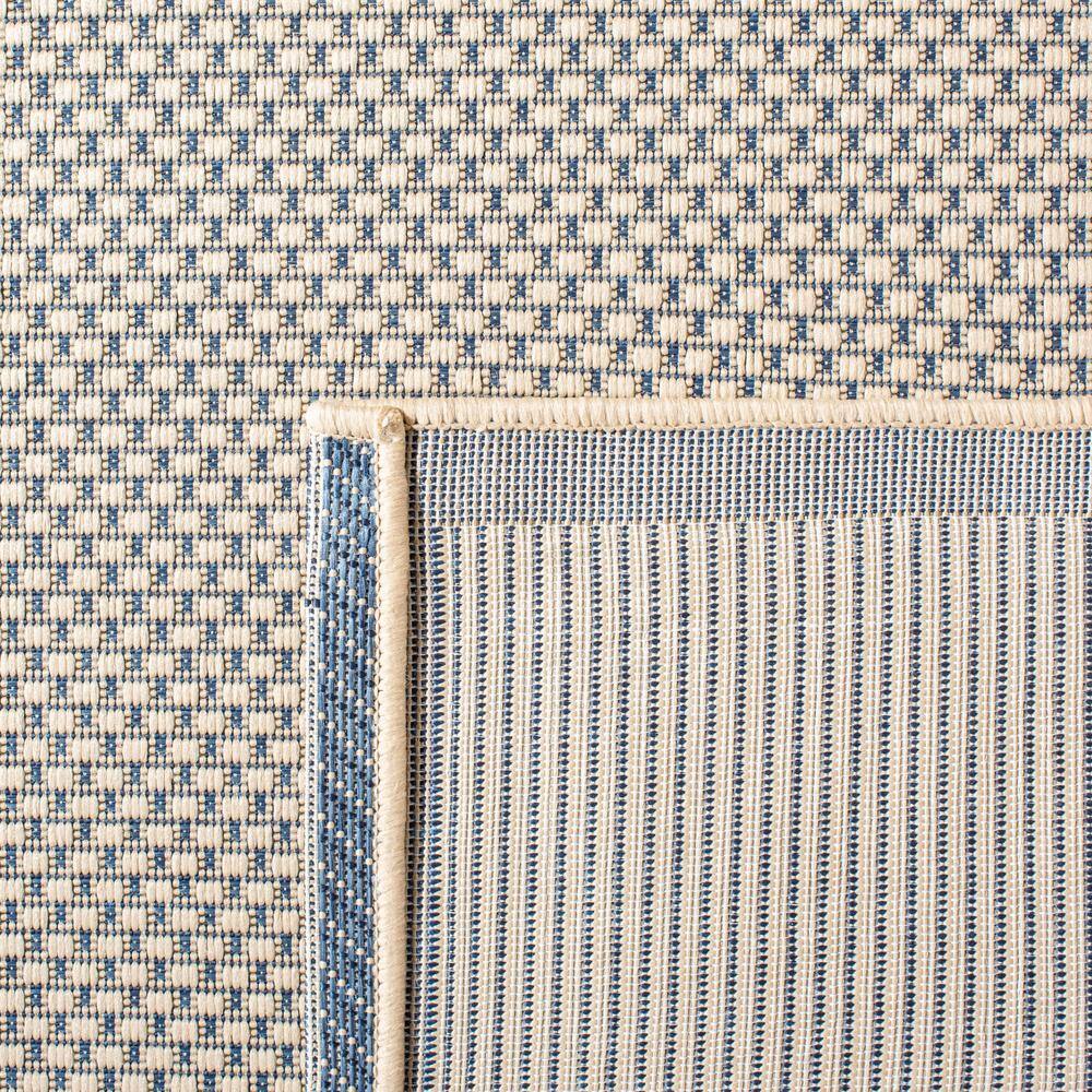 Beige and Navy Rectangular Synthetic 8' x 10' Indoor/Outdoor Rug