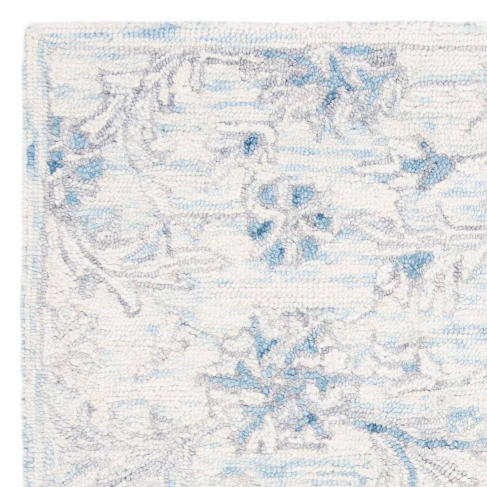 Elysian Bliss Light Blue/Ivory Hand-Tufted Wool Round Rug