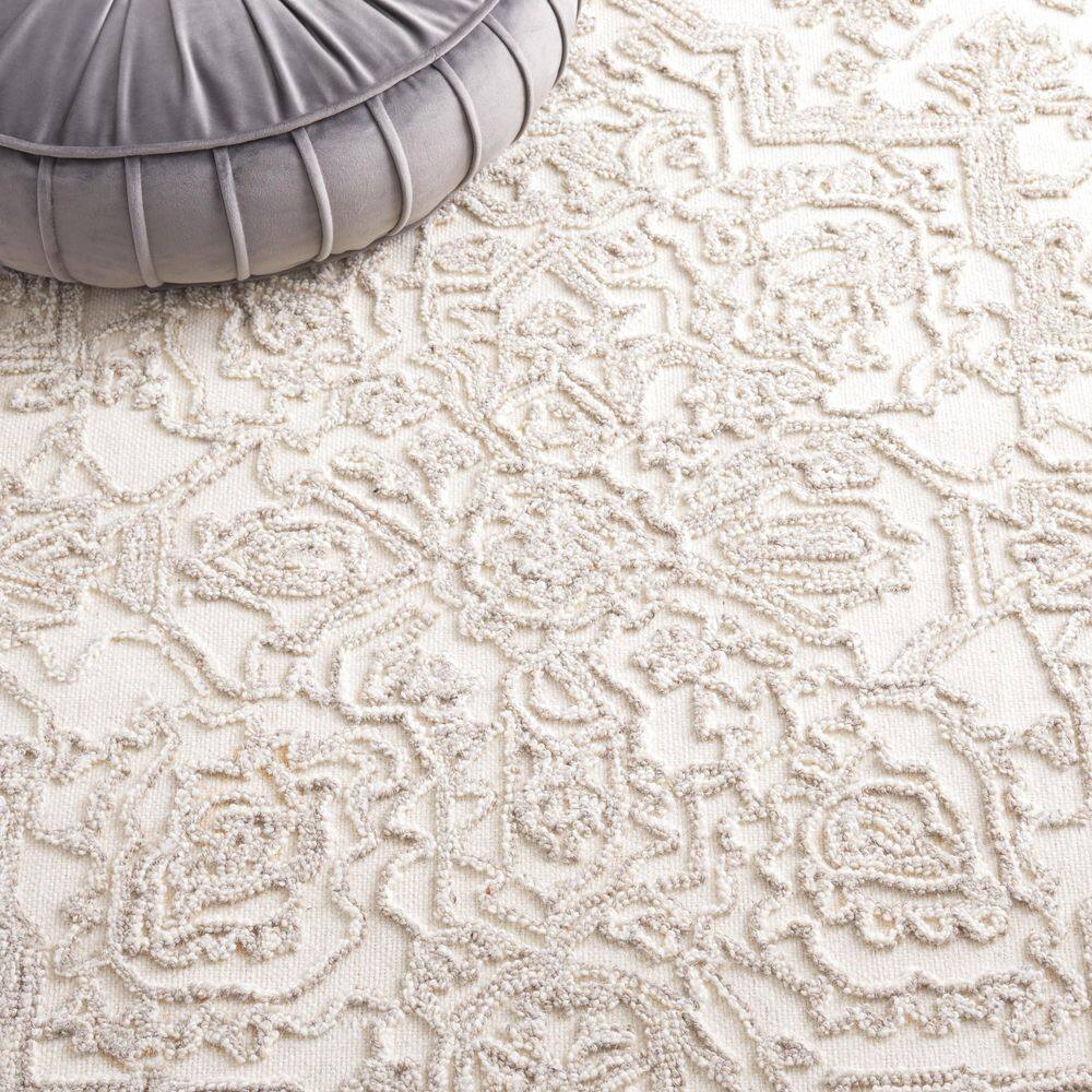 Ivory and Natural 4' x 6' Hand Tufted Wool Area Rug