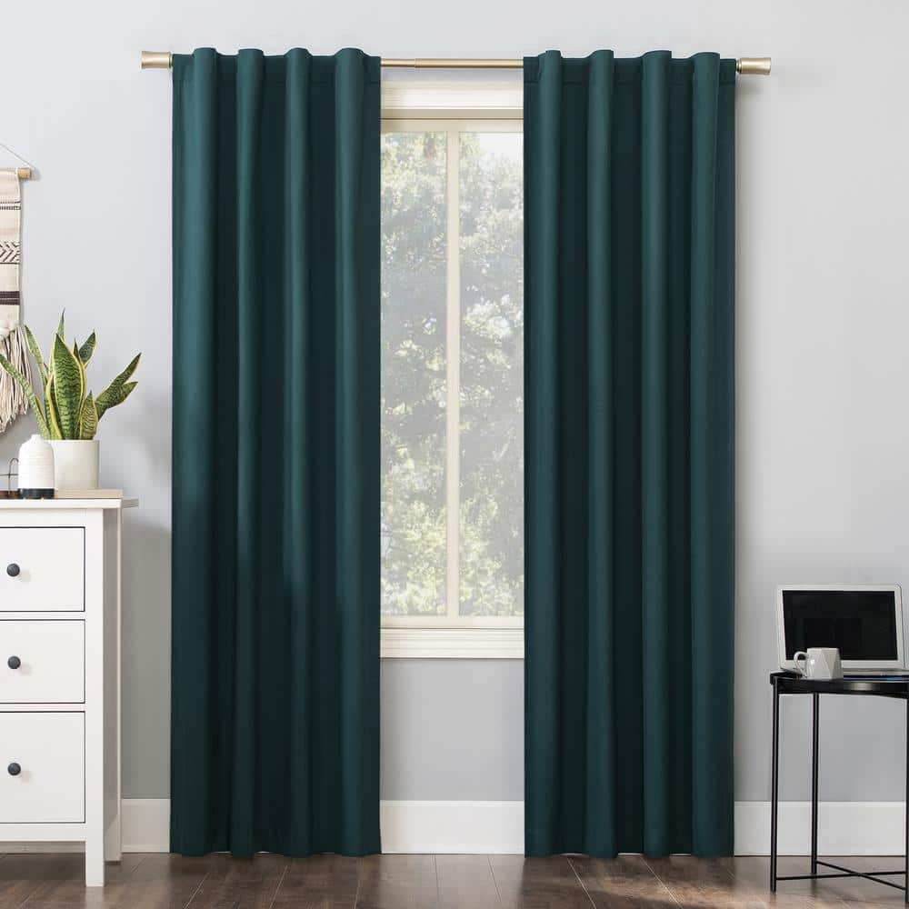 https://images.thdstatic.com/productImages/5299c669-615a-4e17-964f-ec8ec966606a/svn/teal-sun-zero-blackout-curtains-57778-64_1000.jpg