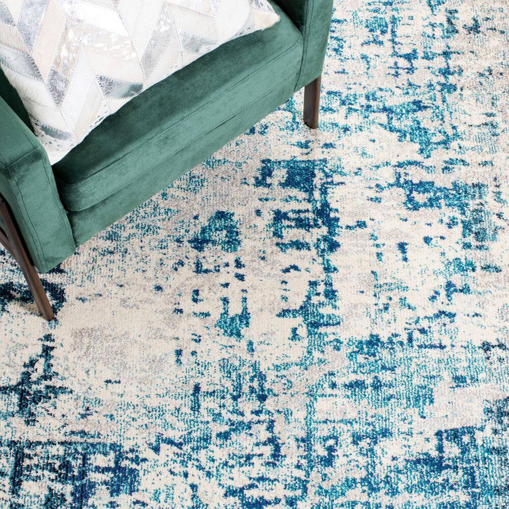 Ivory and Turquoise Square Abstract Synthetic Area Rug