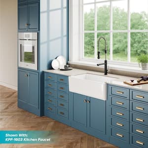 Turino Reversible Farmhouse Apron Front Fireclay 33 in. Single Bowl Kitchen Sink with Bottom Grid in Gloss White