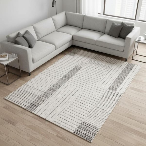 8' X 11' Ivory And Black Striped Area Rug