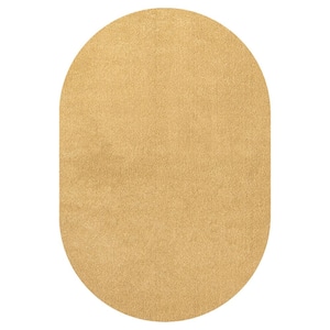 Haze Solid Low-Pile Mustard 6 ft. x 9 ft. Oval Area Rug