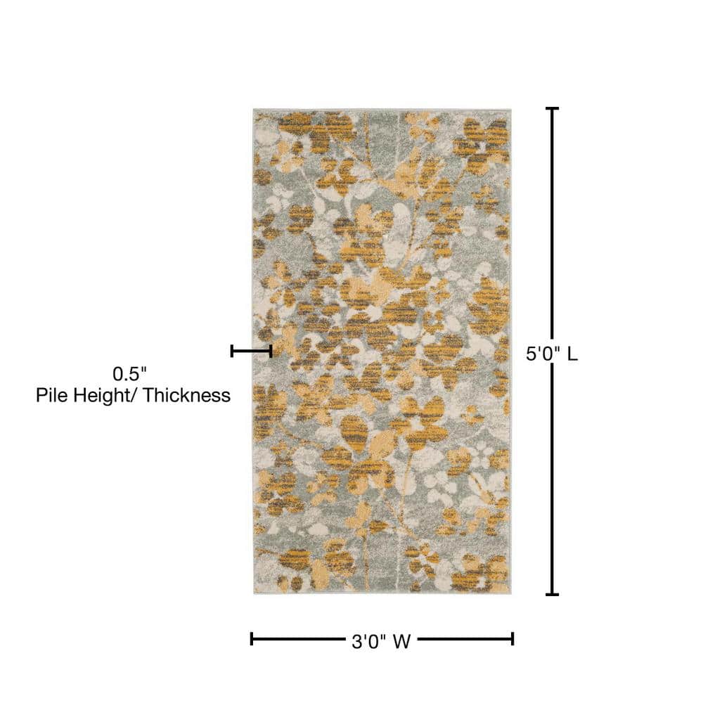 Rectangular 5' x 7' Grey and Gold Synthetic Area Rug
