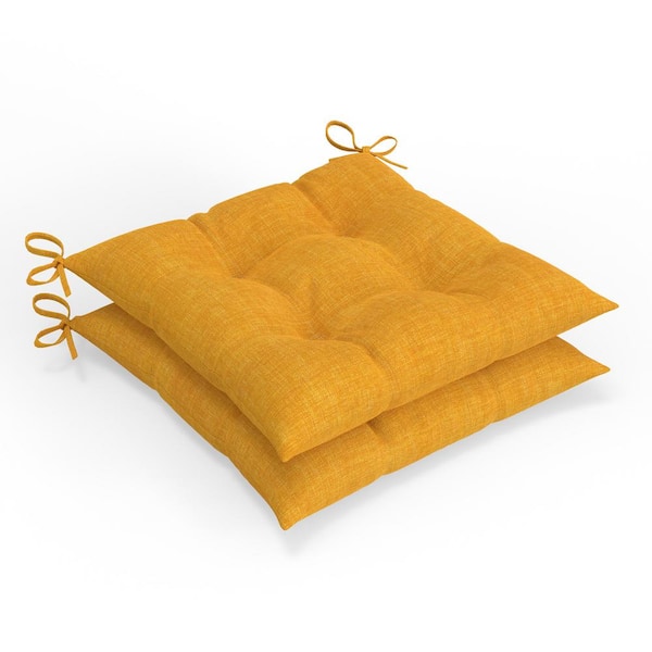 Pillow Perfect Solid Twill 19 in W x 5 in H Square Outdoor Tufted Wicker Chair Pad Cushion with Ties 2-Count in Yellow Splash