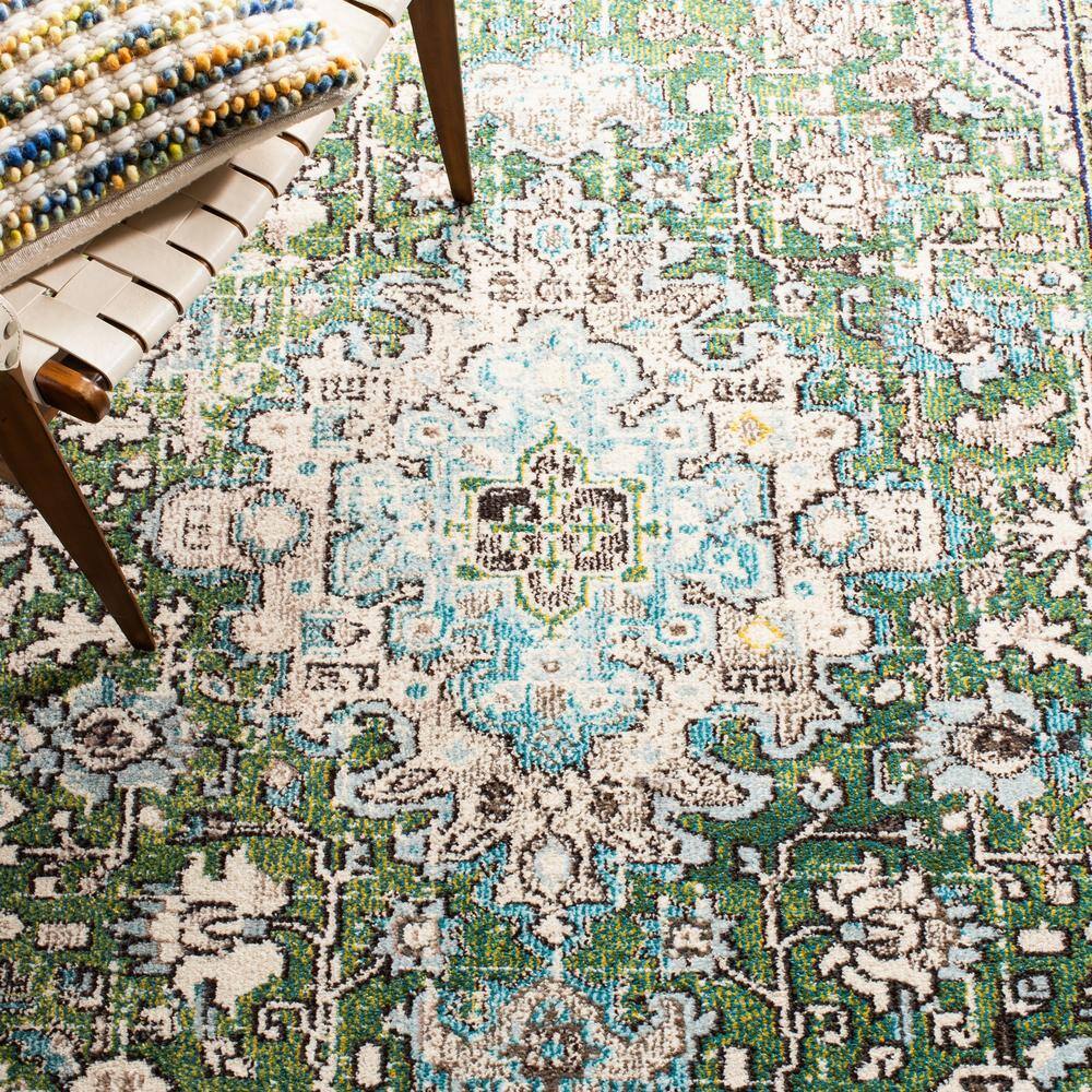 Green and Turquoise 6' x 9' Synthetic Flat Woven Area Rug