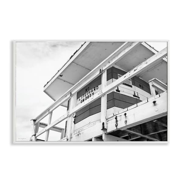 Stupell Industries Lifeguard Building on Beach by Seven Trees Design White Framed Typography Giclee Art Print 20 in. x 30 in.