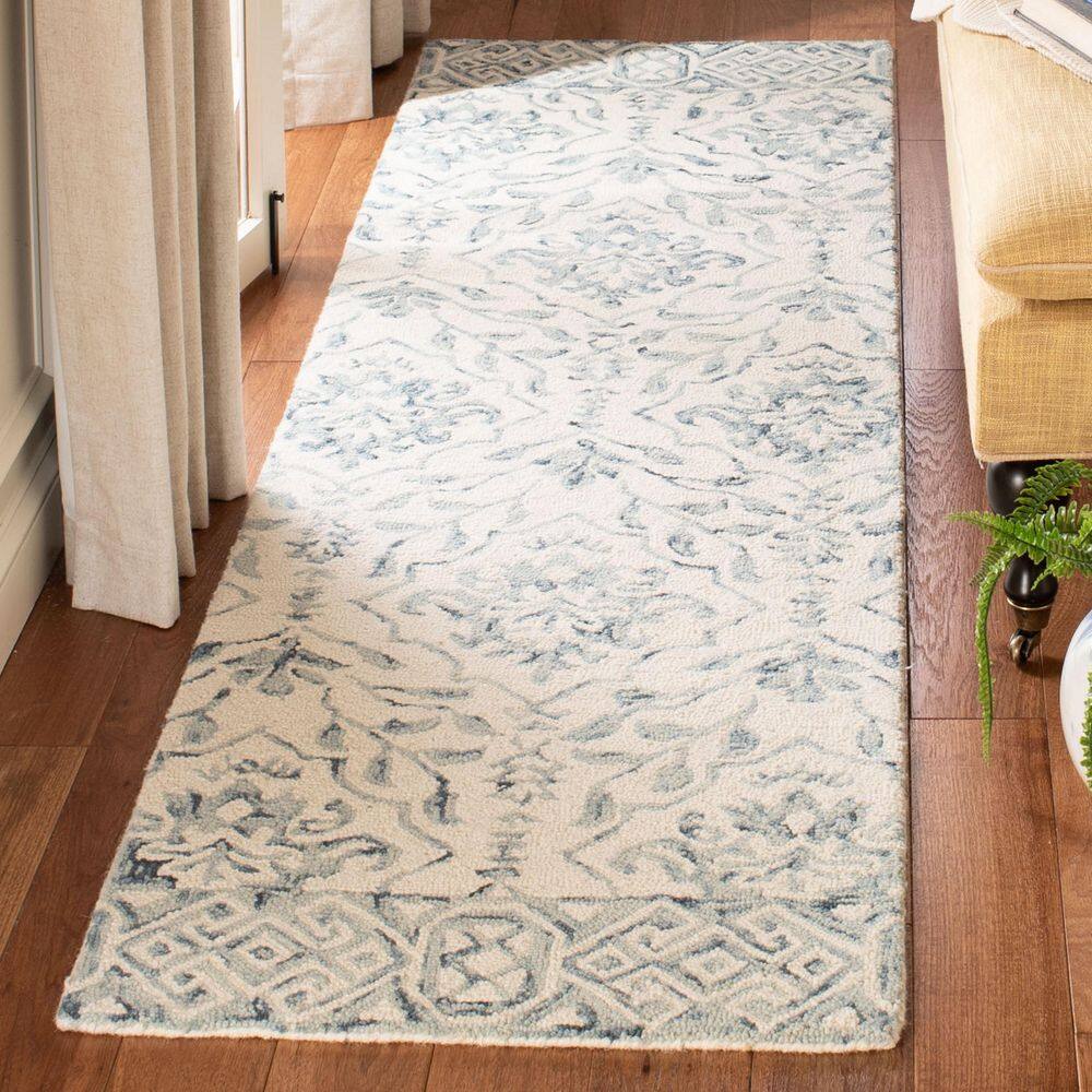 Ivory and Blue Geometric Tufted Wool Runner Rug 27"x12"