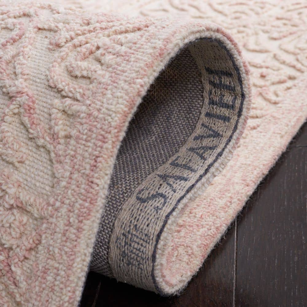 Ivory and Pink Hand Tufted Wool 6' x 9' Area Rug