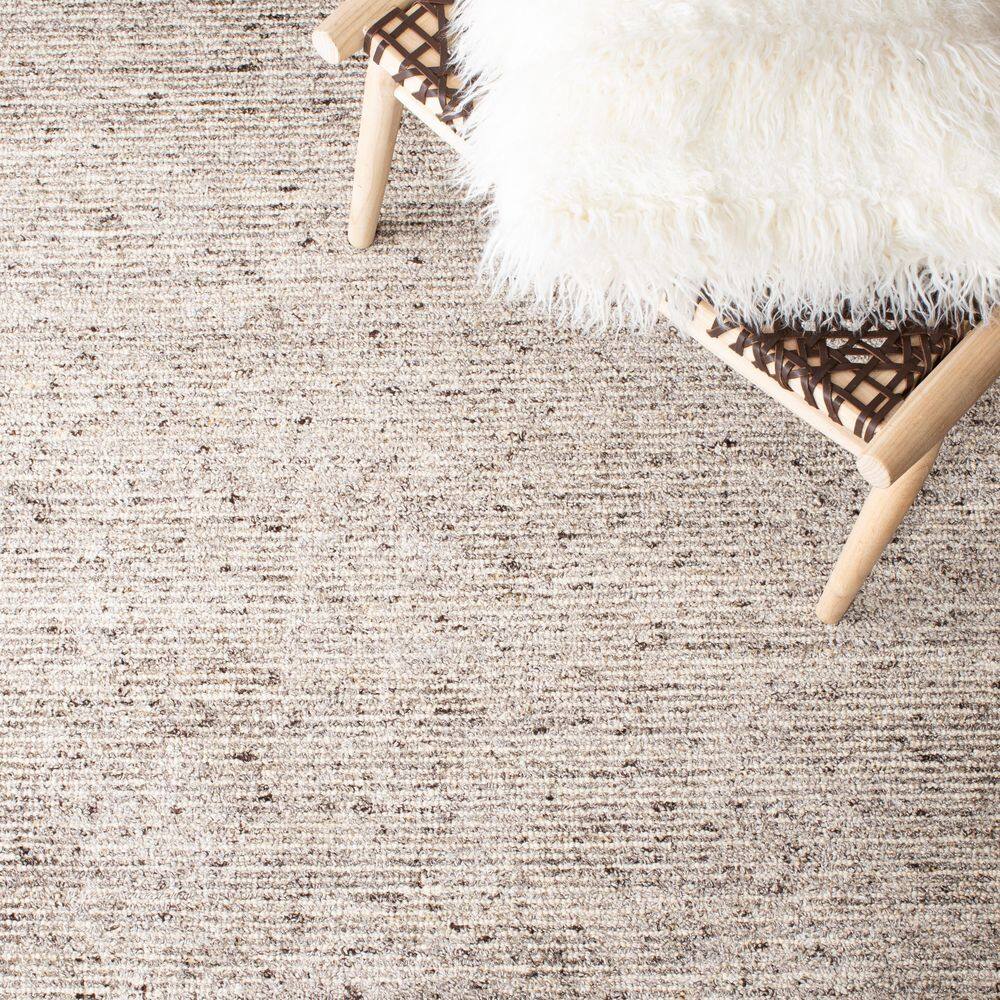 Himalaya 9' x 12' Brown Wool and Viscose Tufted Area Rug