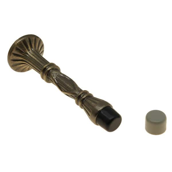 4 in. Solid Brass Ribbon and Reed Arrow Base Door Stop in Antique Brass