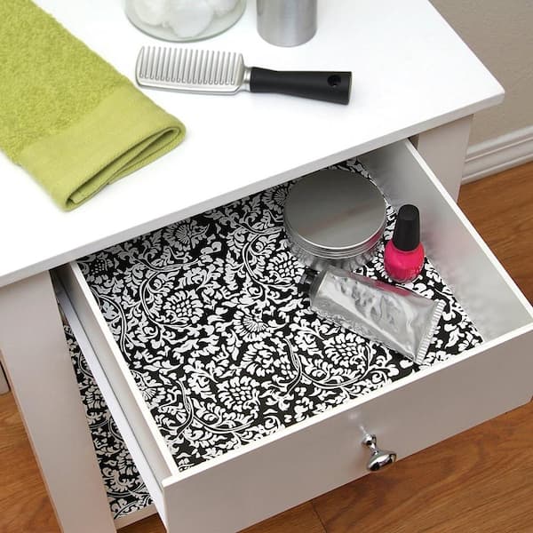 https://images.thdstatic.com/productImages/538afb66-e37d-45cf-822d-ff7947cc1c29/svn/mirabella-black-white-con-tact-shelf-liners-drawer-liners-20f-c9am42-06-31_600.jpg