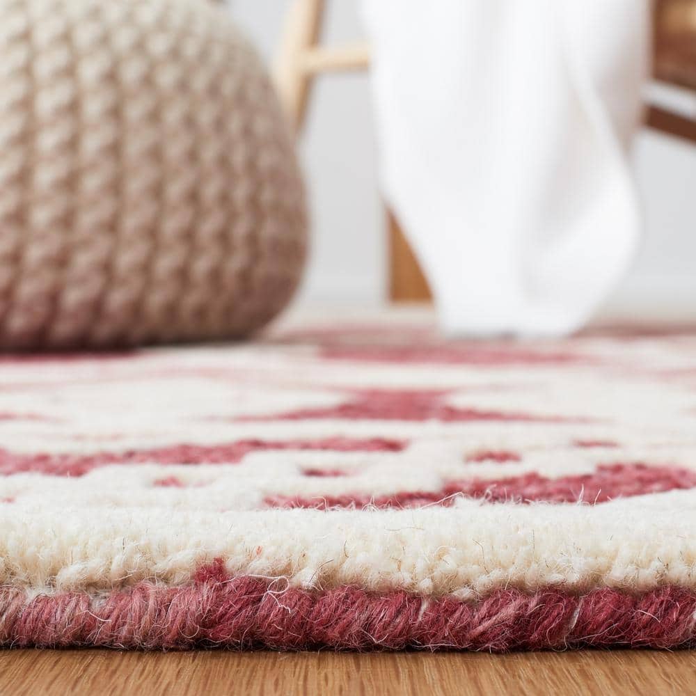 Handmade Red and Ivory Wool Abstract Round Rug, 6' x 6'