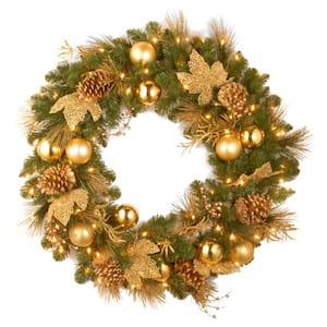 Decorative Collection Elegance Spruce 24 in. Artificial Wreath with Battery Operated Warm White LED Lights