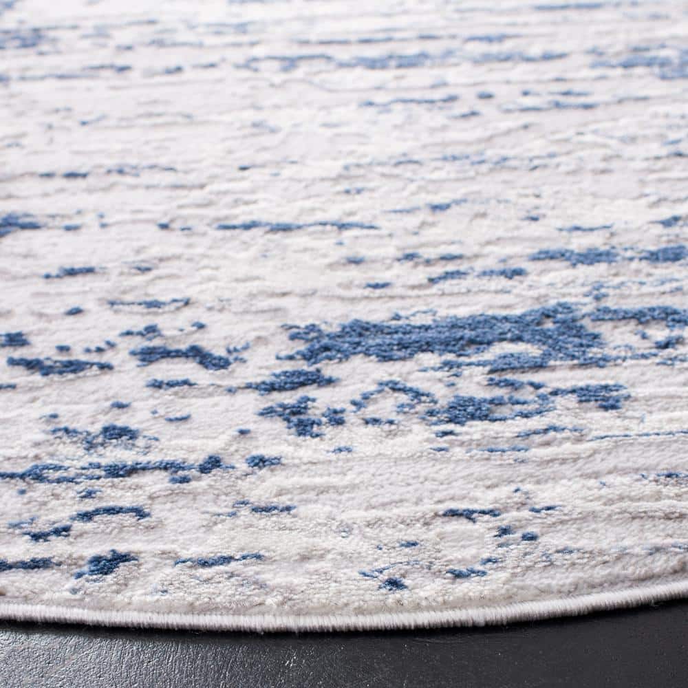 Amelia 8' Round Grey and Navy Abstract Synthetic Rug