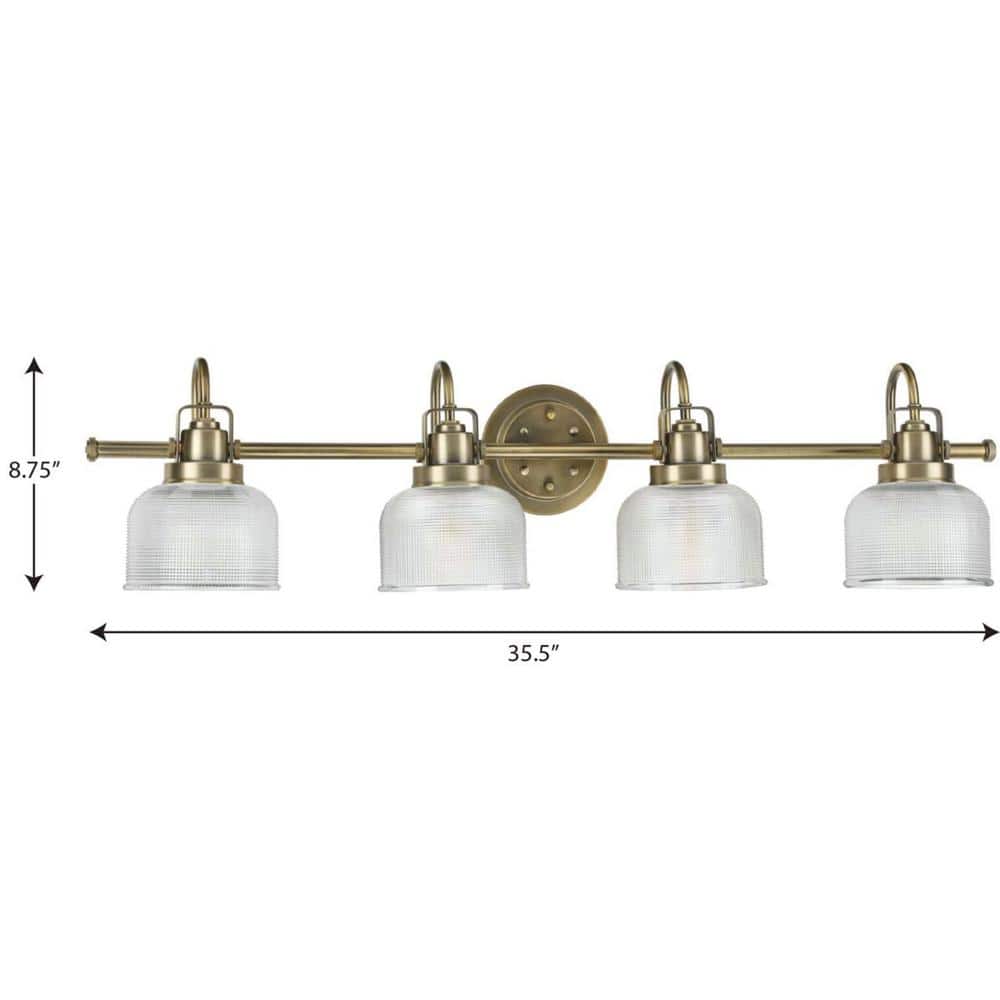 Vintage Brass Four-Light Bathroom Vanity Fixture with Prismatic Glass Shades