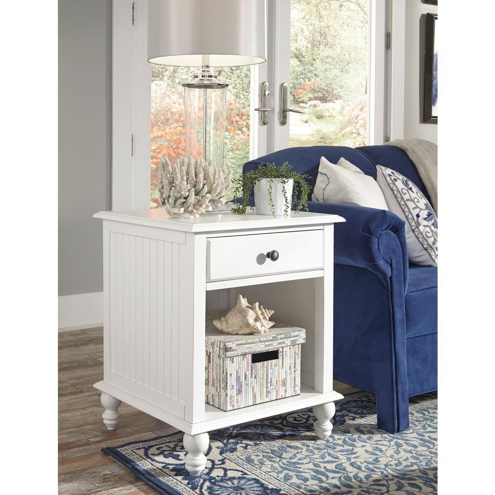 white dresser and end tables