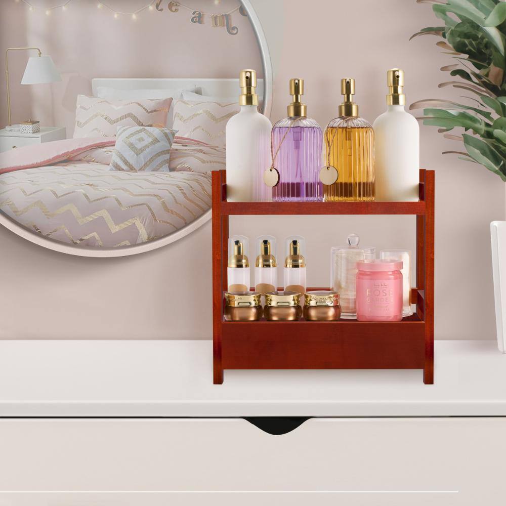 Brown bamboo shelving unit on a bedroom dresser holding lotions.