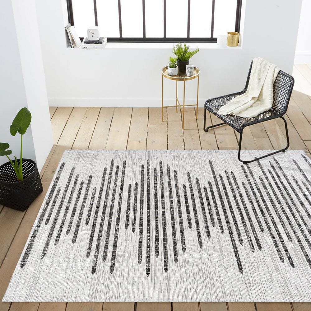 Ivory and Black Striped Synthetic Indoor/Outdoor Rug